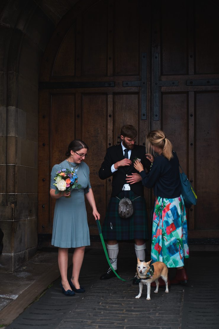 Guy&rsquo;s sister Jo making sure his boutonniere placement is on point.