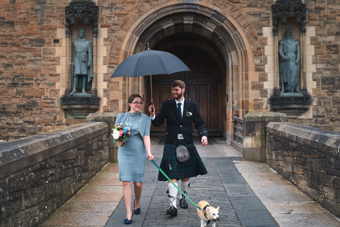 Oh look, it&rsquo;s raining so we need an umbrella on the castle bridge.